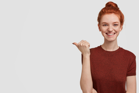 Woman pointing her thumb at statistics